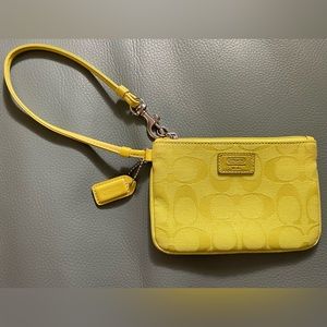 Lime green Coach Wristlet